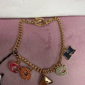COACH Gold Charm Bracelet with Multicolor Accents